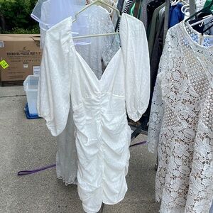 White dress, rouched, size L. Cute detailing. Knee length/slightly above knee.